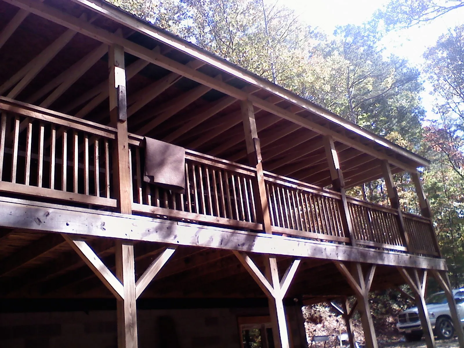 Timber framing under a new elevated porch and deck — Roof Leak Repair in Swisshome by Roofing Brothers